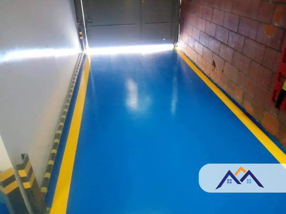 Pintura comercial de local D1 en Bogotá – área de carga de alto tráfico